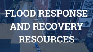 bird's-eye view of a person kayaking in a town flooded with muddy water with superimposed text flood response and recovery resources